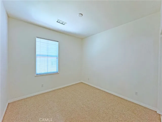 Downstairs bedroom--Take a look at the high quality brand new carpeting that is both stain resistant and soft on your feet