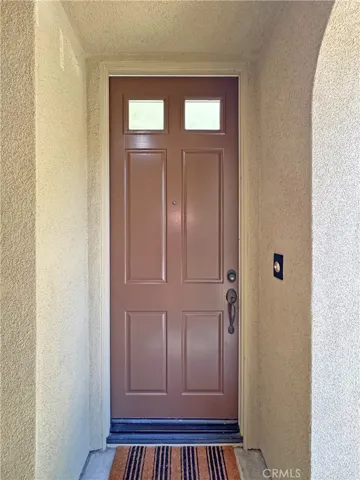 Exterior entry area leading to the stylish  front door