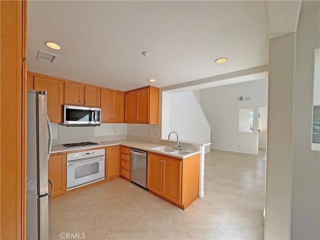 Another view of kitchen looking towards the great room and dining area
