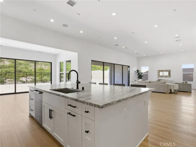 Kitchen to Family Room: Esen Modern Farmhouse - Bella Terra Collection at Tesoro - Homesite 40