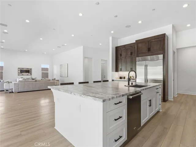 Kitchen to Family Room: Esen Modern Farmhouse - Bella Terra Collection at Tesoro - Homesite 40