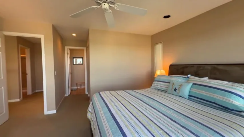 Bedroom with recessed lighting, ceiling fan, and carpet flooring