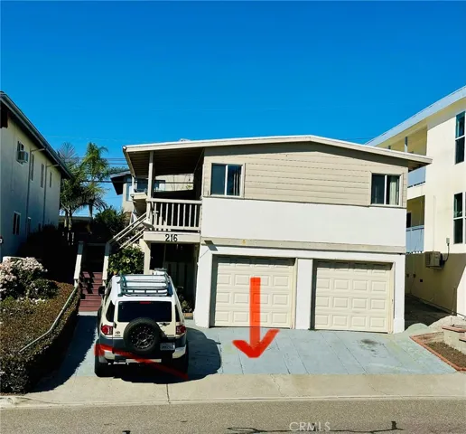 Front of Building showing parking space for​​‌​​​​‌​​‌‌​​‌​​​‌‌​​​‌​​‌‌​​‌‌​​‌‌​​​​ unit.