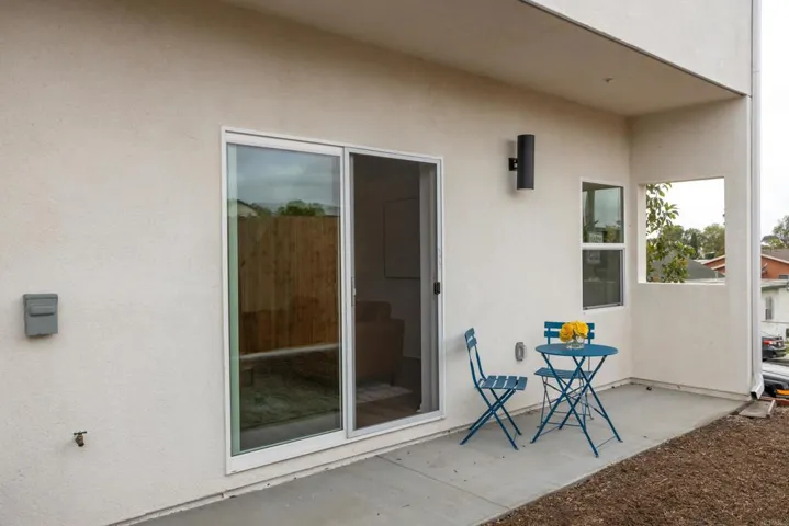 Private patio area accessible from the main living space, ideal for outdoor seating.