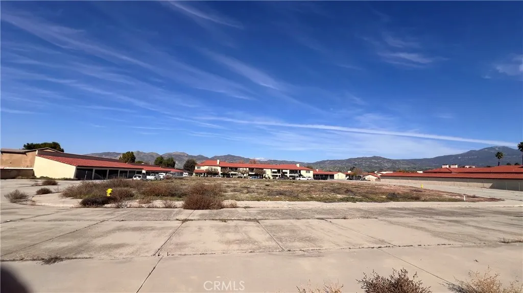 Flat lot with streets, sidewalks and fire hydrants already installed.