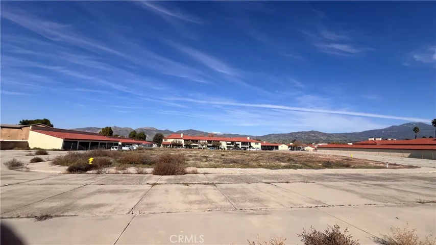 Flat lot with streets, sidewalks and fire hydrants already installed.