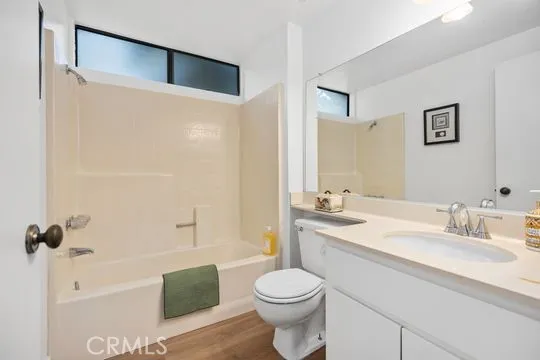 Hall bathroom for use of adjoining bedrooms.