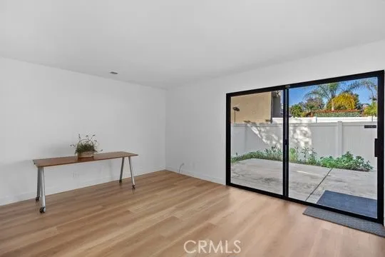 Family room has rear-yard access through sliding doors for indoor/outdoor entertainment