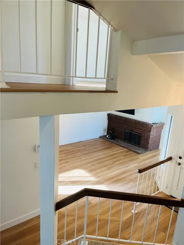 View of living room from top of stairway