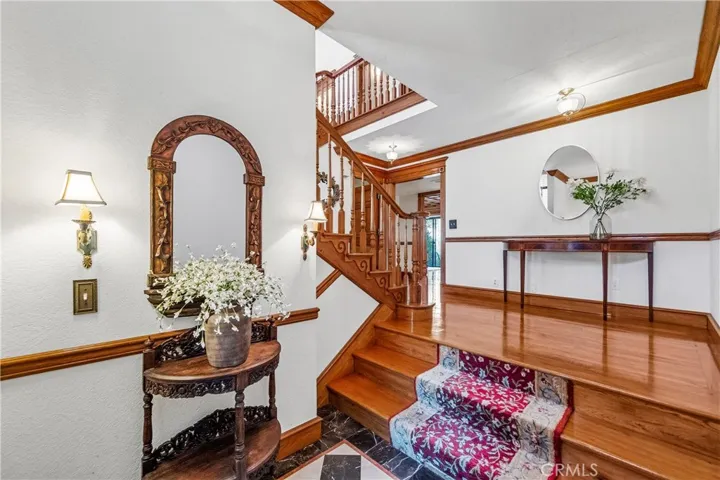 Hickory floors, elegant entry.