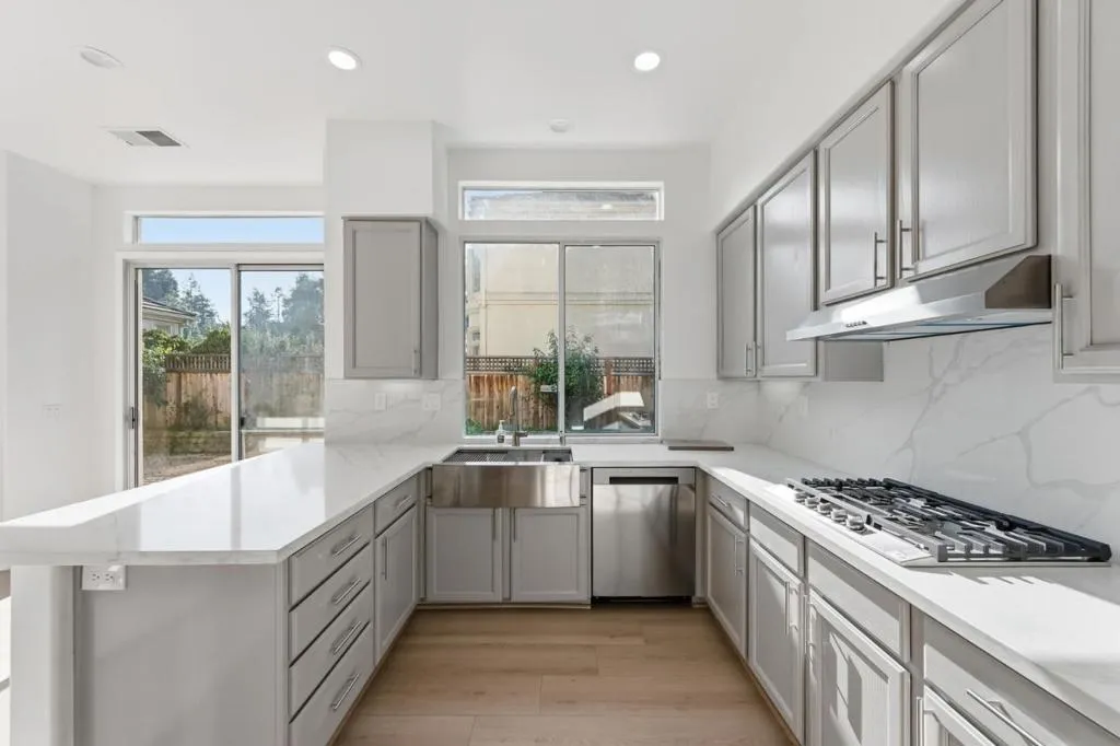 New Countertops, New Apron Sink, New Dishwasher, New Gas Cooktop, New Hardware