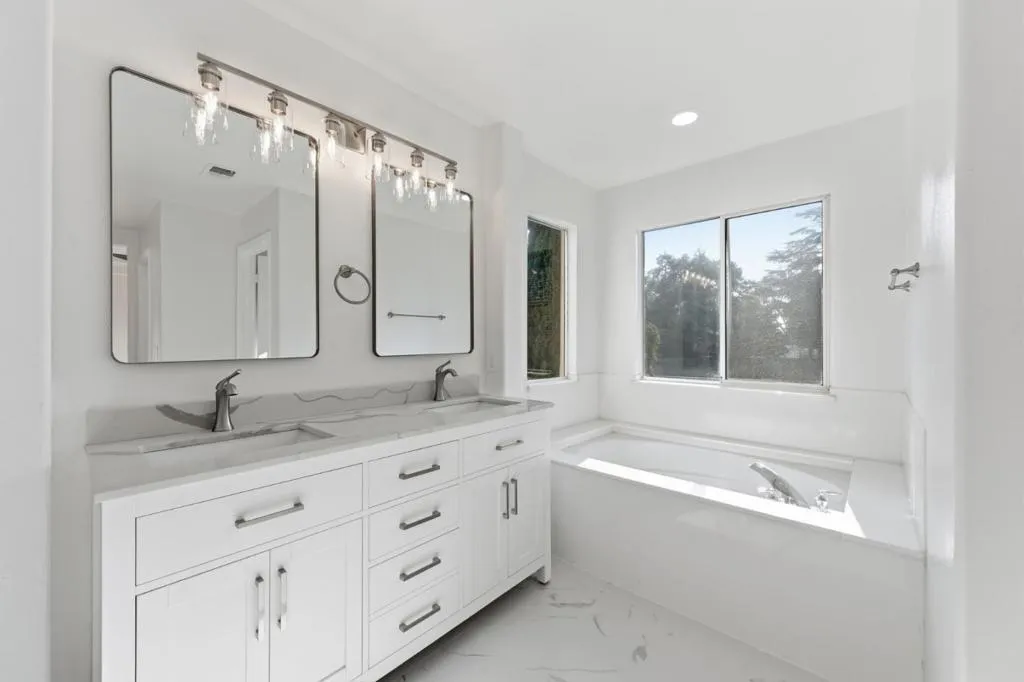 Primary Bathroom with soaking tub and dual vanities