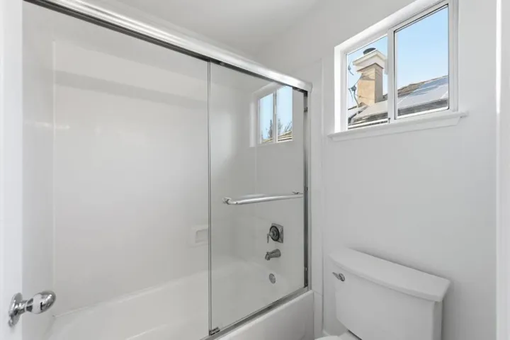 Shared Bathroom with tub and shower