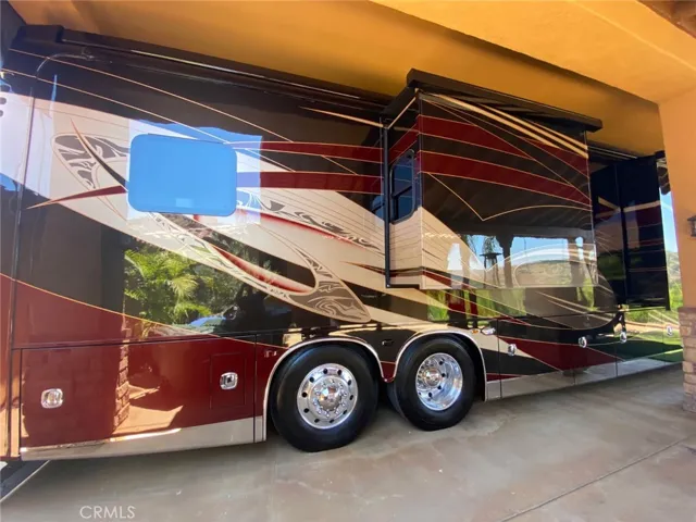 Looking for a Covered RV Parking. 47 feet long with tons of parking. Clean out and electrically.