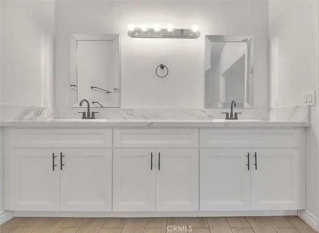 Primary Bathroom vanity and mirrors