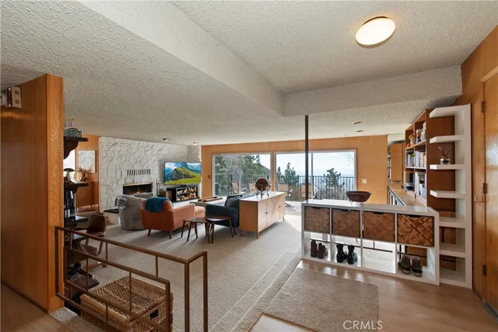 Living room (Lit fireplace and tv screen are virtual)