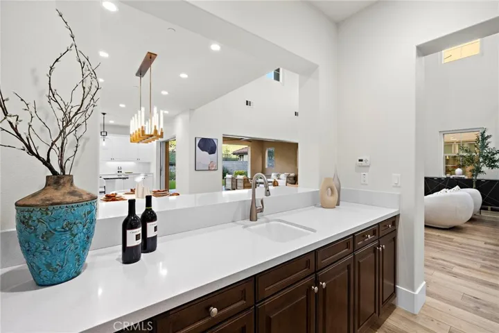 Entertainer’s wet bar overlooking the open living space

