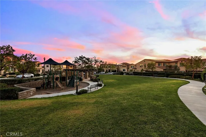 Walking distance to playground and large lawn area
