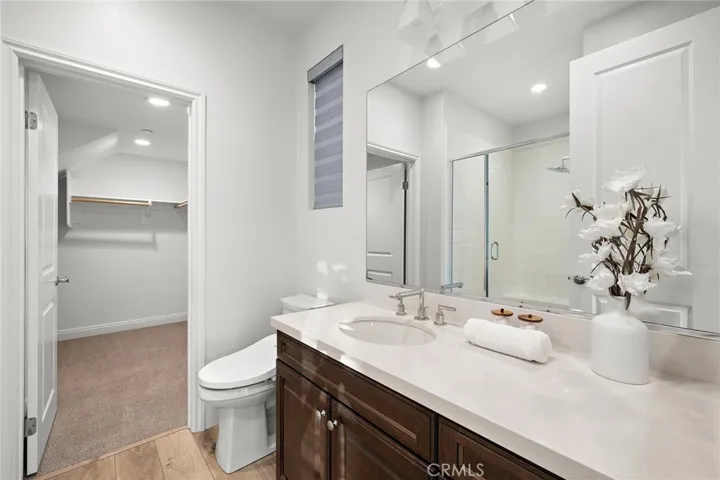 Private bathroom and walk-in closet for first-floor suite
