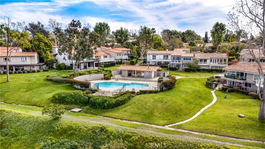 A beautiful pool is located just steps from the property!