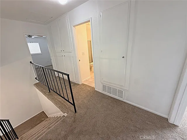 Looking towards bedroom three from bedroom two.