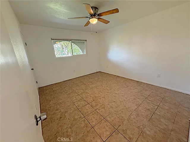 Downstairs bedroom/office doorway from main entrance.