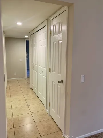 Hallway leading to bedrooms, bath, laundry