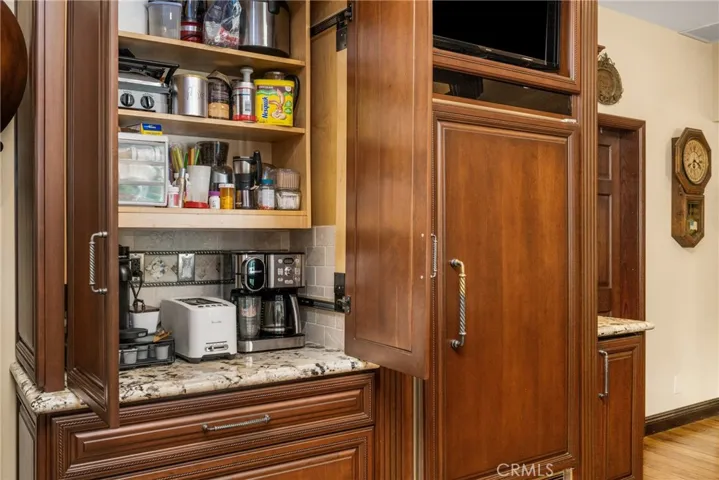 Coffee cabinet and Sub Zero refrigerator