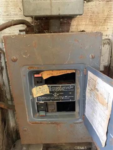 Breaker box below electric meter