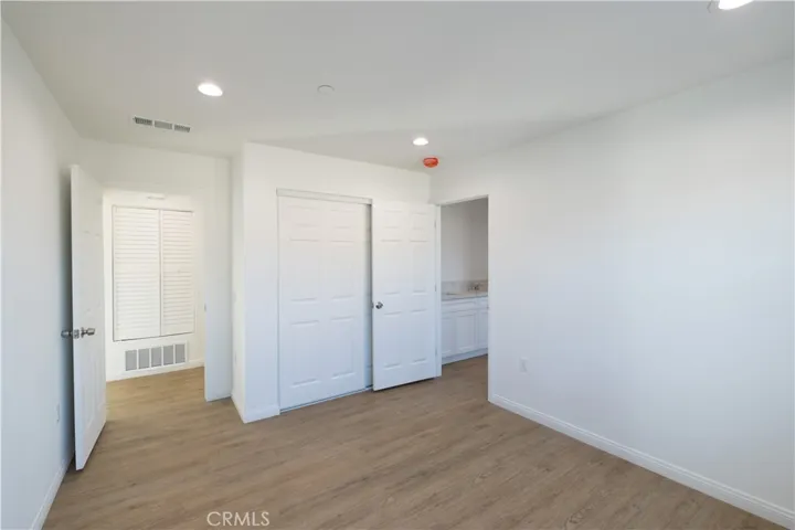 Bedroom 2 with door to  Jack & Jill Bathroom to the right