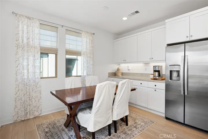 Dining space, including kitchen countertop area.