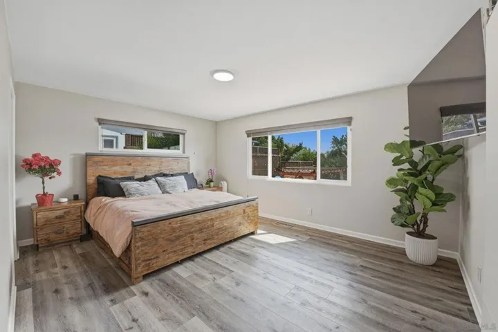 Primary suite with view of back yard oasis
