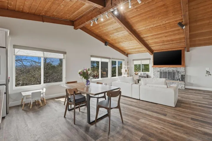 Dining area flooded with light and sweeping views