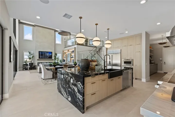 Kitchen to Living Room: Sunstone - Hidden Oaks Collection -                                             
Photo of Model home.  Not actual home for sale.  Home is still under construction.