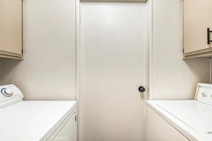 Indoor laundry room.  Washer and dryer included.