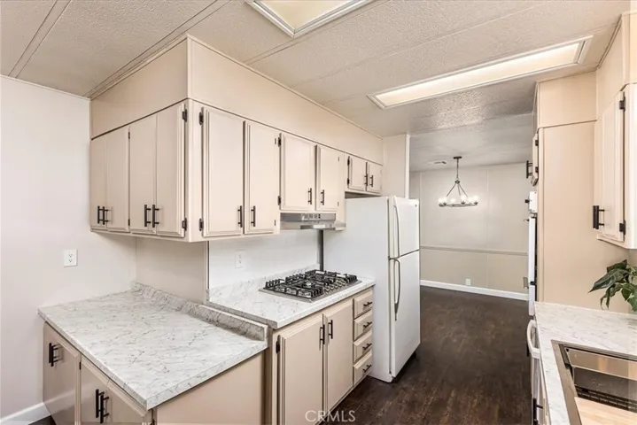 other side of kitchen that adjoins dining area.  New counter tops.