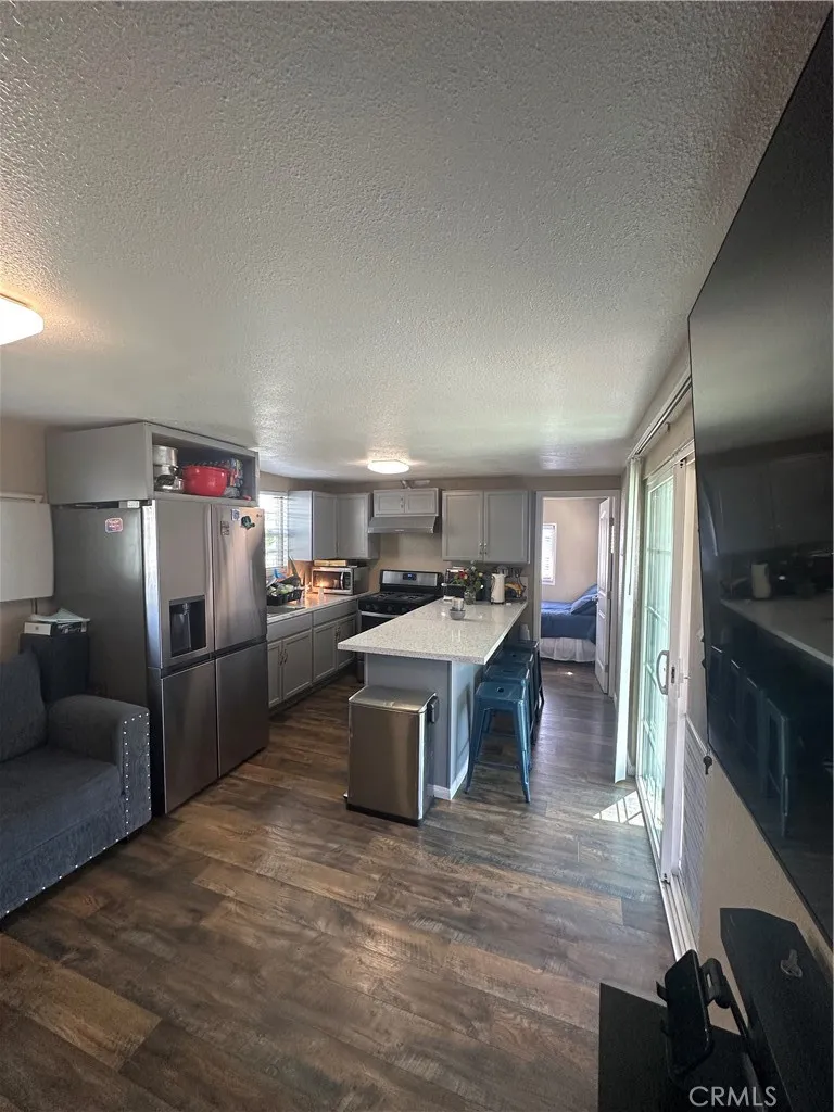View from hall way to kitchen and breakfast nook