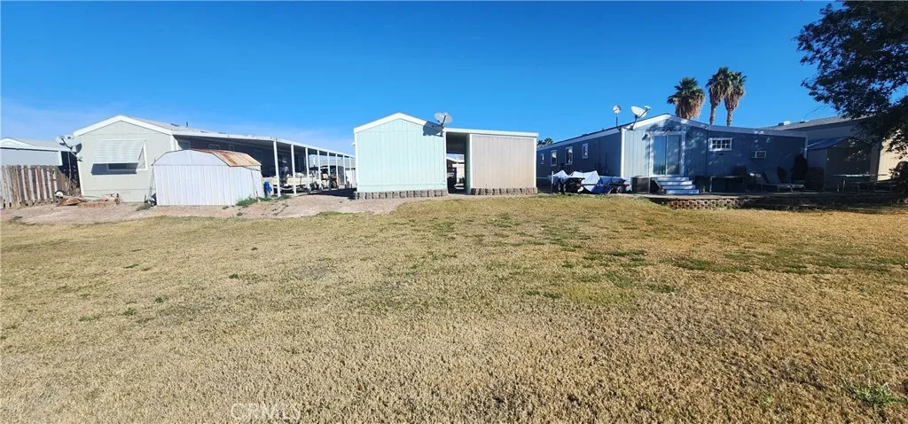 Grass area behind the house