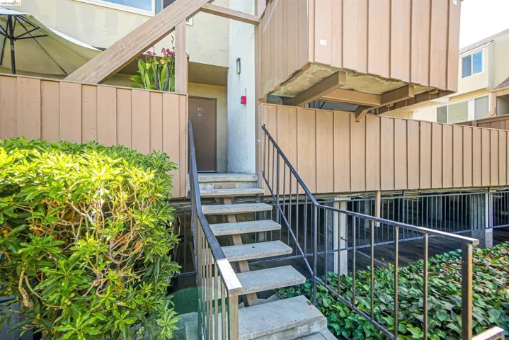 View of exterior entry featuring board and batten siding