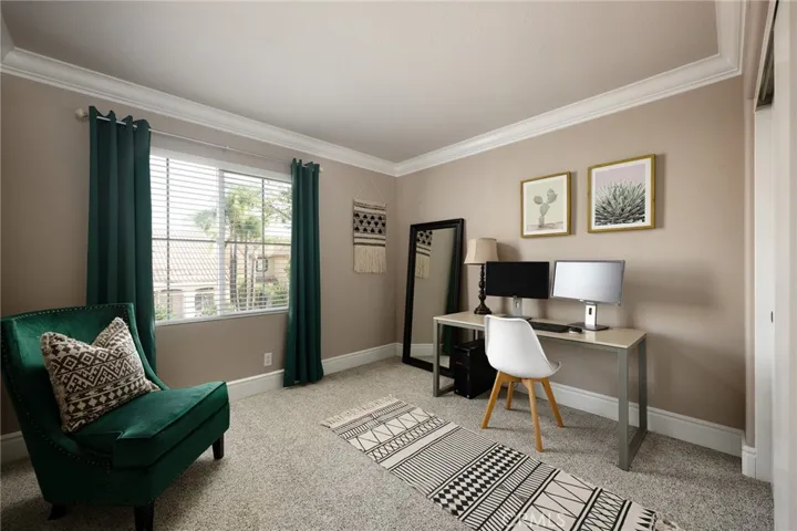 Additional guest bedroom located upstairs.