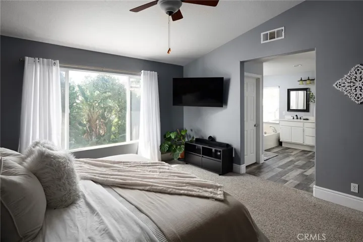 Primary bedroom and bathroom