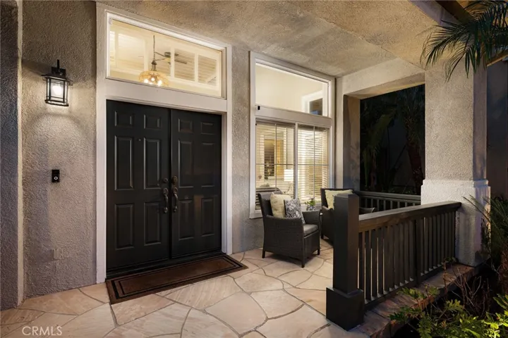 The home features a welcoming front porch.