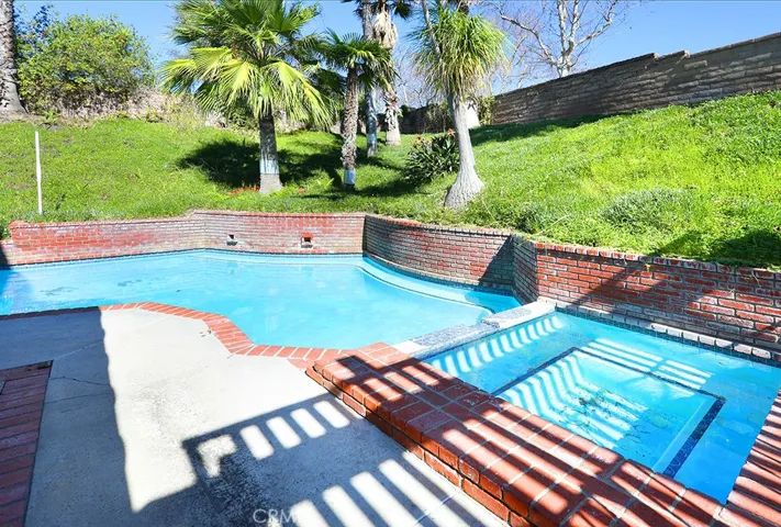 Private yard with pool and spa