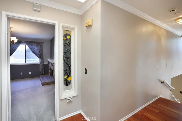 Upstair hall entering primary suite