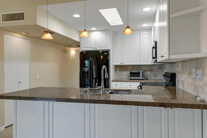 KITCHEN OVER BREAKFAST BAR MLS