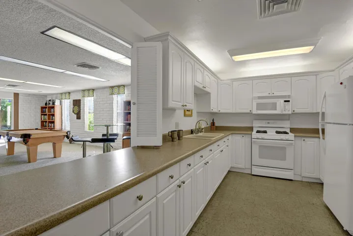 CLUBHOUSE KITCHEN TO GAME ROOM MLS