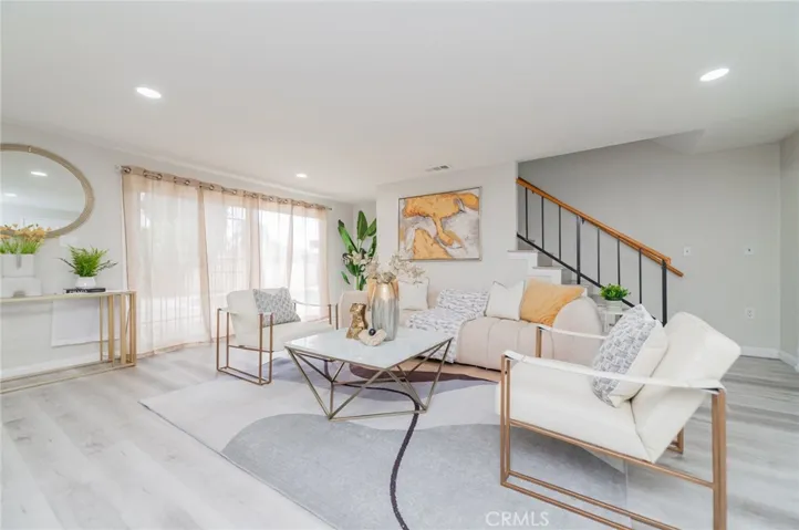 Family Room- SPC floor. Child barrier iron gate to pool (outside Sliding Glass door)