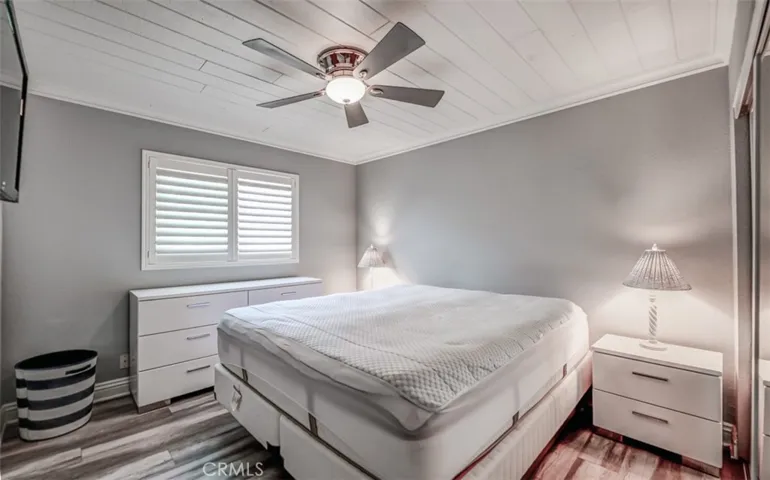 Primary Bedroom without bedspread and painting
