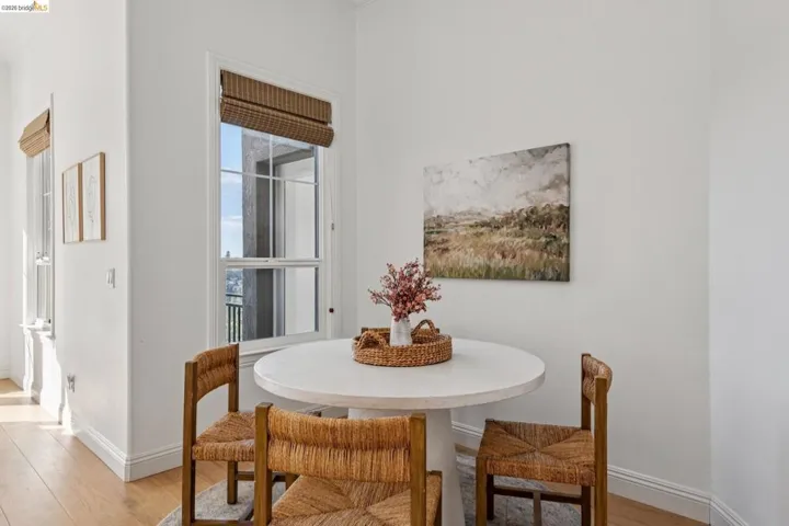 Dining area with light wood-style flooring