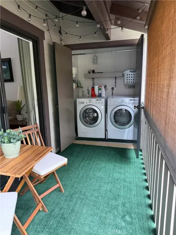 Laundry inside closet in balcony